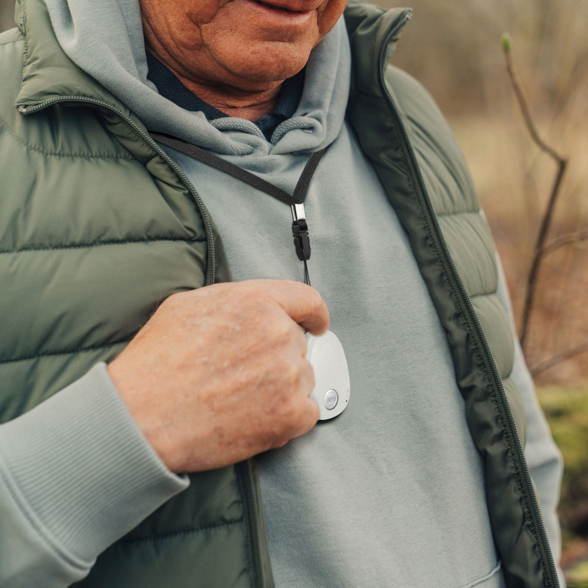 Person wearing GPS Pendant