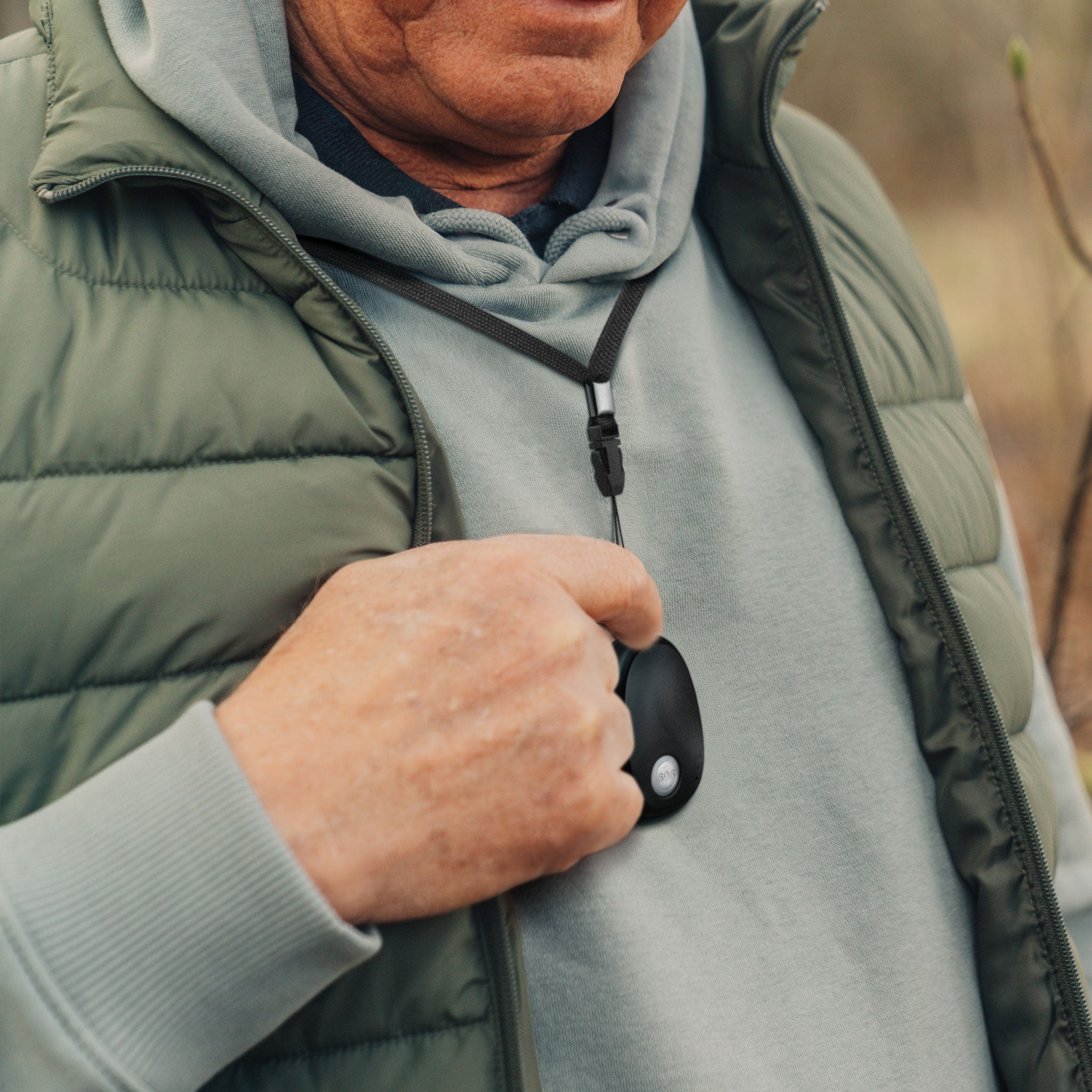 Person wearing GPS Pendant